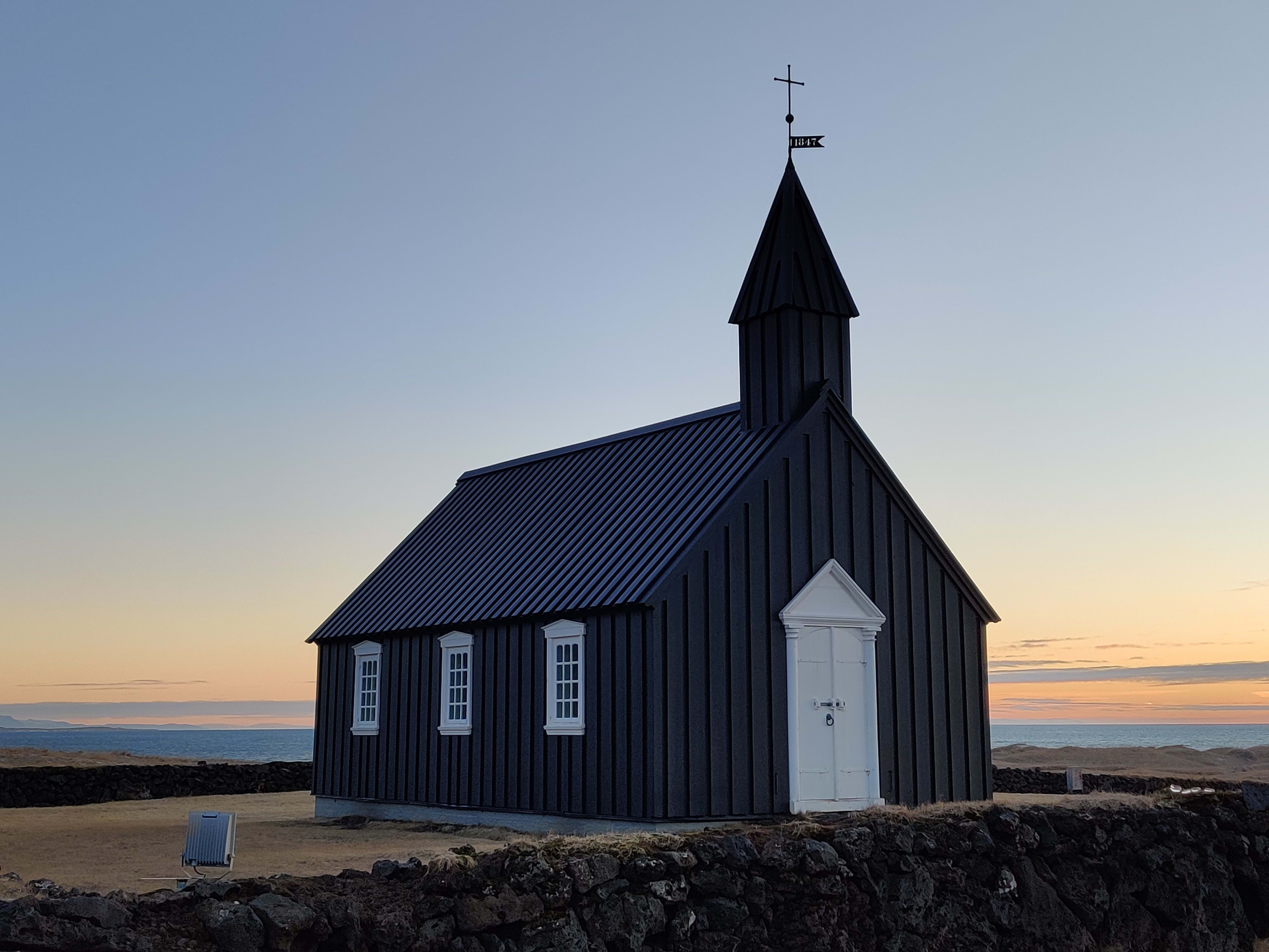 budir black church at sunset